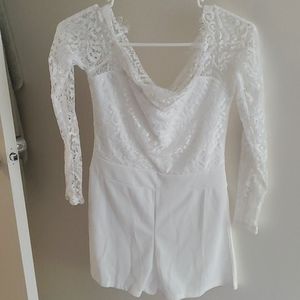 White ruffled top off the shoulder romper